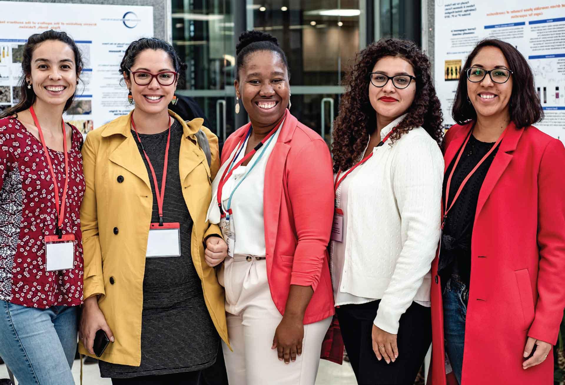 Faculty of the Future member teaching women about Schlumberger.